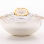 The Sturgeon caviar cooler / server with caviar tin developed by Hossein Akef